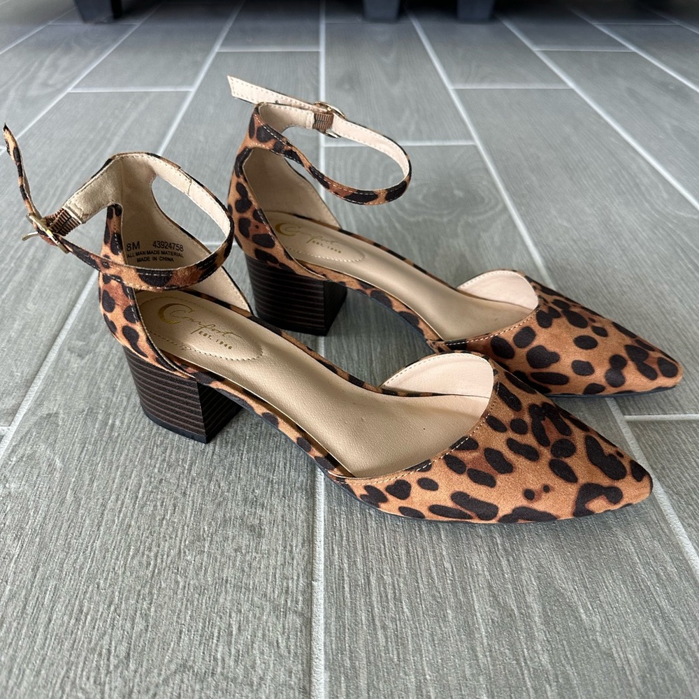 Leopard print pointed toe shoes with 2” heel.